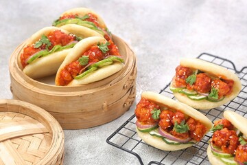 Korean Chicken Bao .Bao buns with chicken crispy and vegetable. Asian cuisine