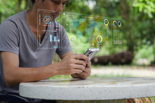 Man Using Smartphone with Augmented Reality Data Display in Nature