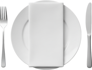 A white plate with a folded white cloth napkin sits between a silver fork and a silver knife isolate Silverware Table setting Dining Restaurant Formal