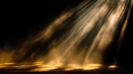 Golden rays of light shine through dust particles on a black background, creating a magical and surreal atmosphere.