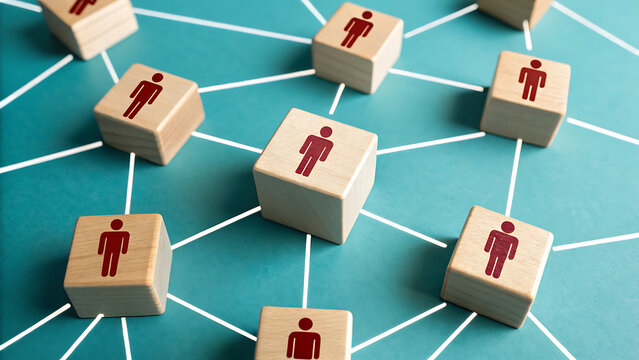 Wooden blocks with people icons connected by lines represent networking