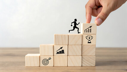 Hand placing wooden block on top of staircase with graph and trophy icon