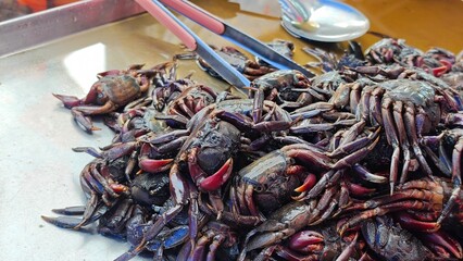 Preserved crab or Thai salted crab.
