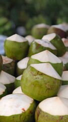 Young coconut in the market.