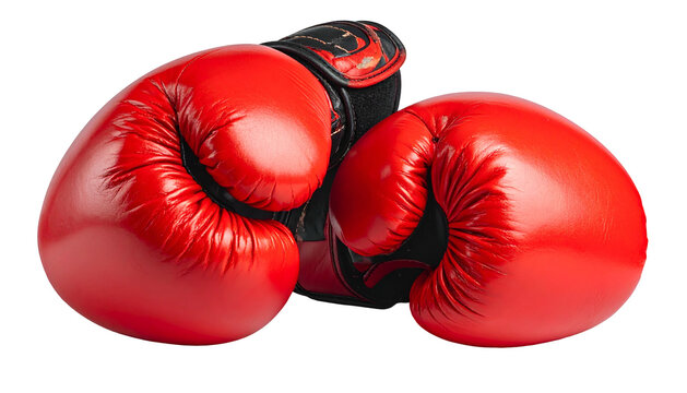 A pair of vibrant red boxing gloves, one resting on the other, isolated against black