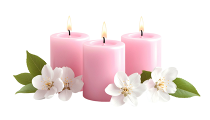 Three pink pillar candles with lit flames and white flowers, leaves on black
