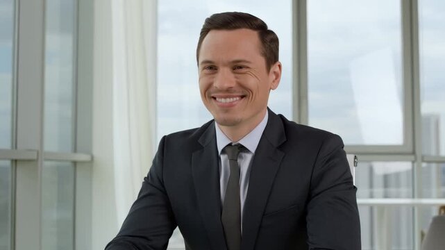 A confident business executive in a modern office, exuding professionalism and approachability Stock Video