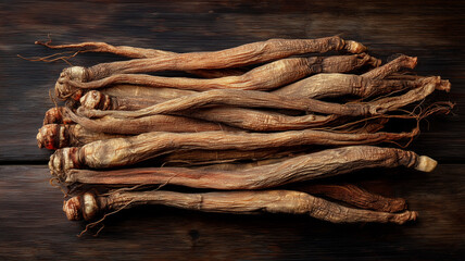 Dried Korean red ginseng roots arranged neatly on wooden surface, showcasing their unique texture and color. This natural herbal product is known for its health benefits and traditional uses