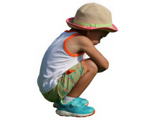 Young child in a hat and summer clothes crouching down isolated on transparent background