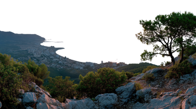 Coastal Vista: A scenic view unfolds, where rugged mountains meet a tranquil shore, under a gentle sky. The image offers a sense of vastness and natural beauty.