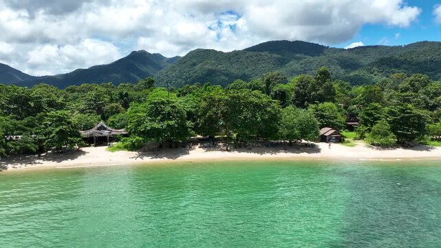 Nipa Hut And Dense Trees Along The Klong Kloi Beach On The Island Of Ko Chang, Thailand. Aerial Drone Shot