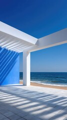 Modern Beachfront Architecture With White Pergola Structure Blue Wall And Ocean View Under Clear Blue Sky