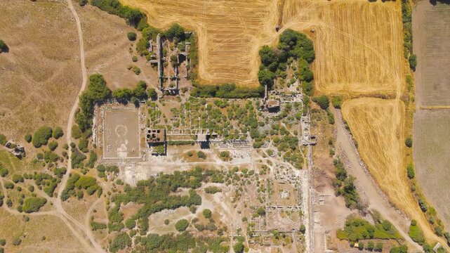 Balat, Turkey. Aerial view of the Capito Roman Baths and South Agora complex at Miletus archaeological site. Aerial View, HEAD OVER SHOT with rotation