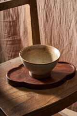 An empty rice bowl tableware with a retro wooden background