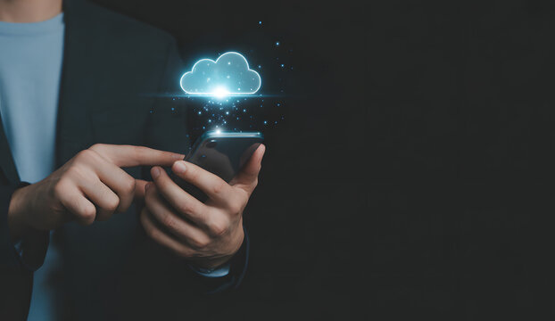 Cloud Connectivity at Your Fingertips: A person holding a phone with a holographic cloud icon representing digital networking, symbolizing modern technology and the ease of accessing information.