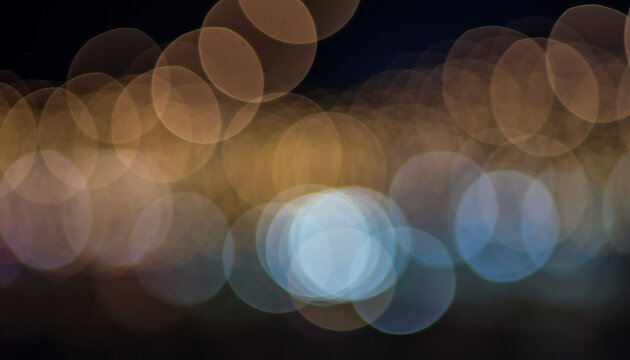 Soft bokeh lights with warm and cool tones - Powered by Adobe