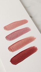 Discover luxurious rose gold and berry lipstick swatches, showcasing vibrant shimmer and rich texture, perfect for beauty campaigns and editorial features