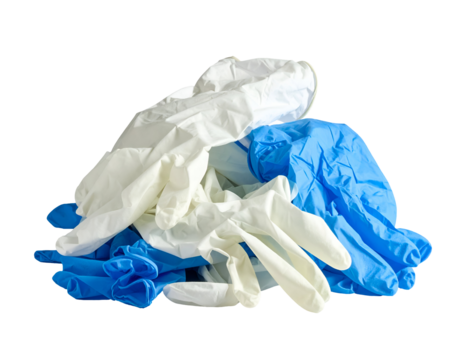 Pile of disposable medical gloves in white and blue nitrile and latex, crumpled protective handwear PPE for hygiene and safety on isolated background