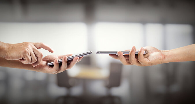 Digital marketing concept on mobile smartphone and financial strategy with mobile online payment, business investment and advertising on bokeh office background. - Powered by Adobe