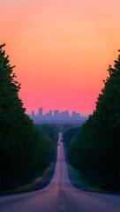 Road to the city at sunset with trees and a colorful sky in the background view landscape