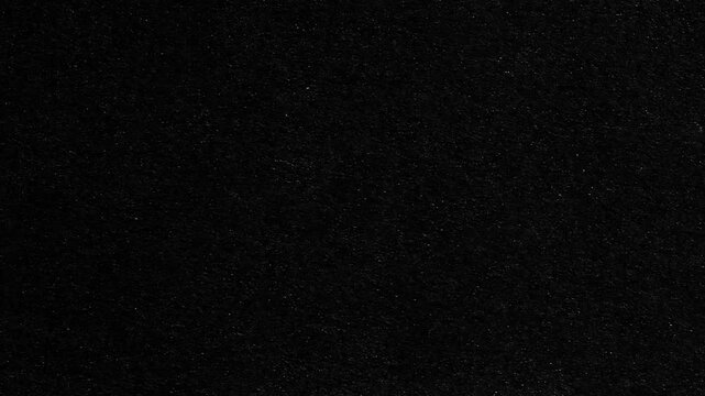 Vintage film noise overlay. Authentic black and white dust, grain