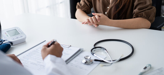 Healthcare. Doctor and patient are discussing interview consulting patient. Professional medical...