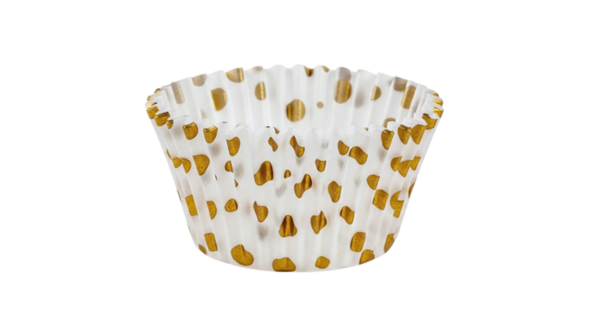 Empty white cupcake paper cup with golden dots isolated on transparent background, a festive baking supply for muffins and desserts, closeup shot