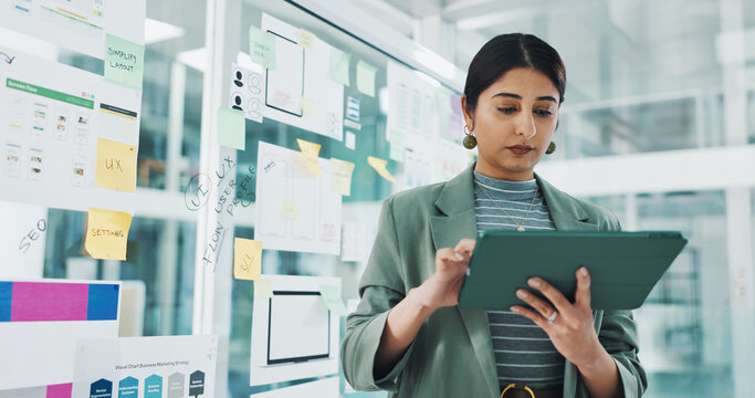 Woman, tablet and review for app development at startup, checklist and application with flowchart. Person, tech and click with information technology, software and ux design project at digital agency