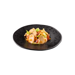 Delicious seafood salad with fresh vegetables on a dark plate