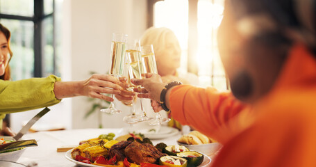 Women, hands and glasses with cheers, food or meal for celebration or gathering together in home. People, toast or group of friends with champagne, dinner or feast for reunion or party in house