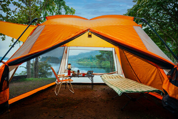 Camping tent, view from inside the tent to see the view outside the mountain, forest, lake, camping...