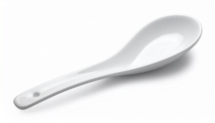 White ceramic soup spoon with broad bowl and short handle on neutral background for editorial culinary photography traditional utensil decor and poetic nourishment-themed visuals