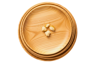 Bread crumbs on stacked empty wooden plates symbolize hunger isolated on transparent background