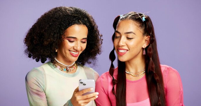 Smartphone, friends and women in studio, internet and smile with email on purple background. Gen z, mobile user or people with cellphone, network and digital app for communication and online chatting