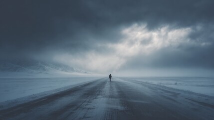 Obraz premium Lone figure walking winter road landscape