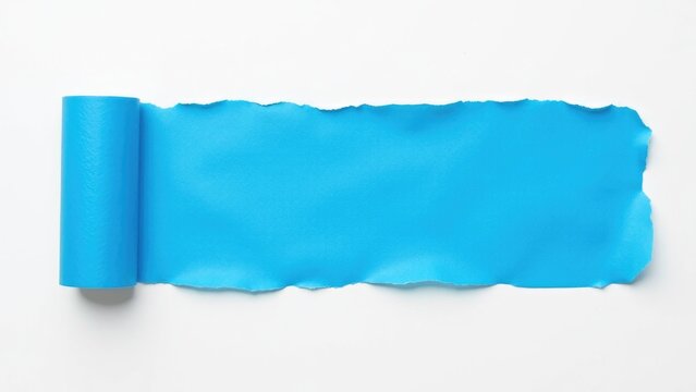 A roll of blue paper on a white surface