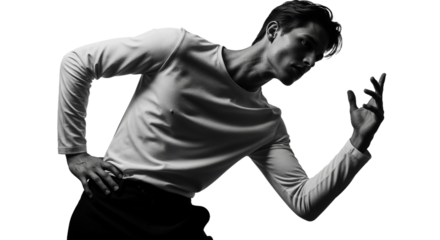 Model showcasing dynamic pose in dramatic black and white setting with striking light contrast