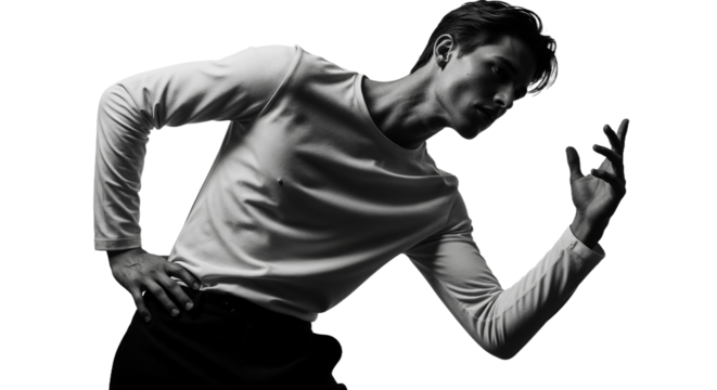 Model showcasing dynamic pose in dramatic black and white setting with striking light contrast