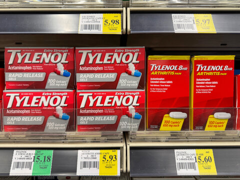 Tylenol Rapid release gels fever reducer and Tylenol arthritis pain on a display shelf in an American pharmacy drugstore. Everett, WA, USA - 30 October 2025