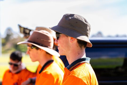 trade apprentice wearing hearing protection listening to instructor