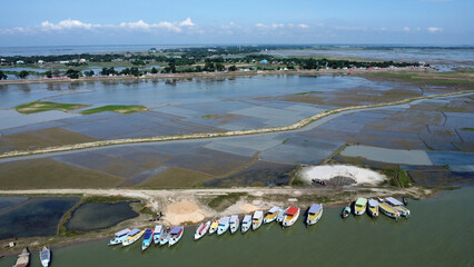 Bangladesh faces flooding and crop damage due to sudden water inflow from India, affecting riverside communities and agricultural lands.Bangladeshi farmers cannot grow crops as floodwaters flood 