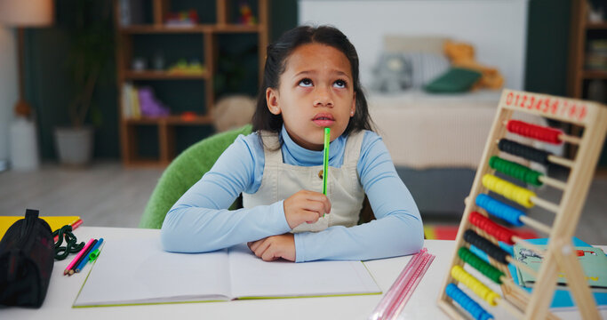 Thinking, homework and book with child in home for brainstorming, math solution and vision. Reflection, problem solving and education mindset with girl in house for studying, curious and memory