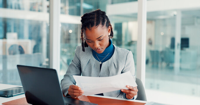 Laptop, business woman and paperwork in office for investment report, stocks analysis and IPS. Portfolio manager, black person and tech with documents at desk for economic data and performance review - Powered by Adobe