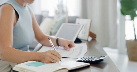 Calculator, writing and budget with hands of person in home for savings, account paperwork and tax...
