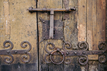 detail of a medieval door in a Spanish village