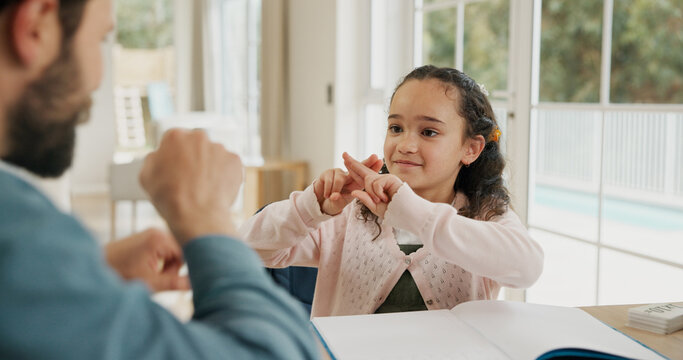 Dad, kid and learning sign language in home for development, growth and care in homeschool. Education, father and teaching student asl, hand gestures and happy girl with hearing disability in house