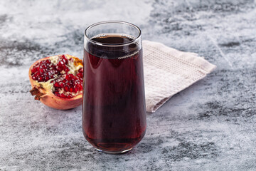 Sweet vitamin pomegranate juice glass