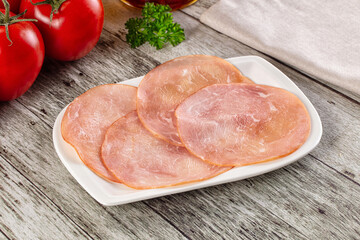 Smoked pork tenderloin fillet slices