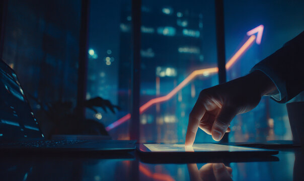 Analyzing data trends for business growth with a digital tablet device. - Powered by Adobe