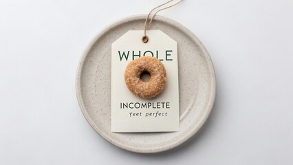Minimalist Presentation of a Doughnut on a Plate with a Tag Featuring Catchy Phrases for Food Photography